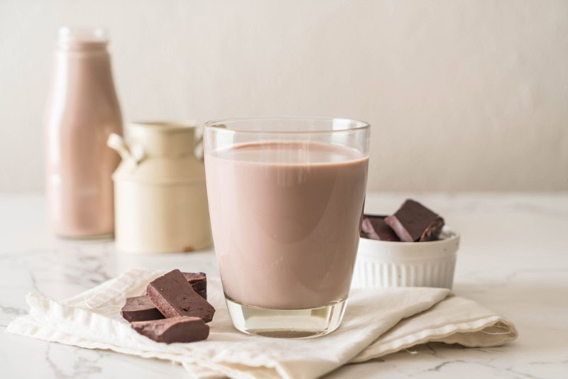 glass of chocolate milk on table